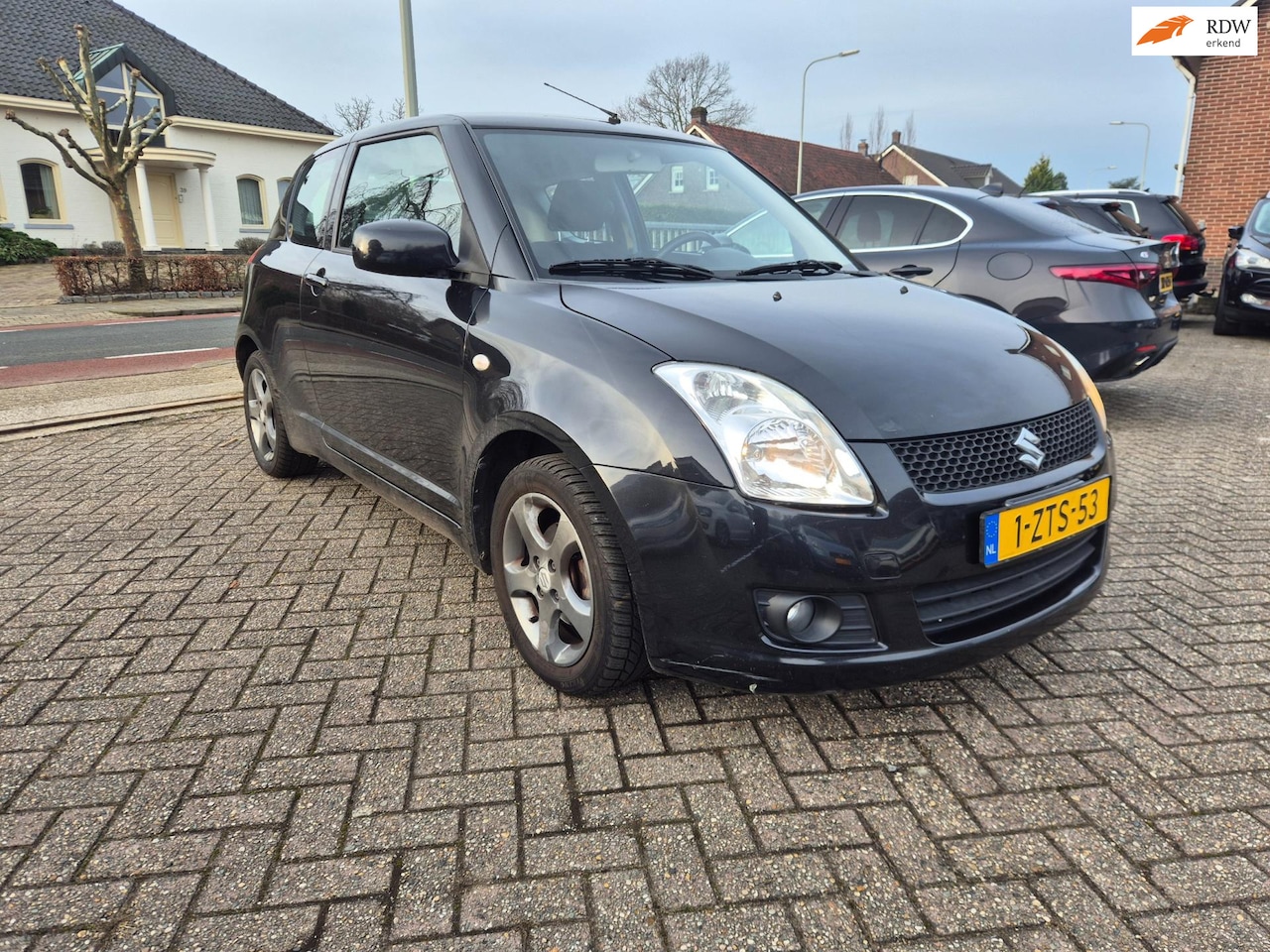 Suzuki Swift - 1.5 Comfort Koppaking defect - AutoWereld.nl