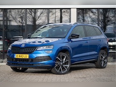 Skoda Karoq - 1.5 TSI ACT Sportline Business | Trekhaak | Adapt. Cruise | CANTON | Camera | 19" | Winter
