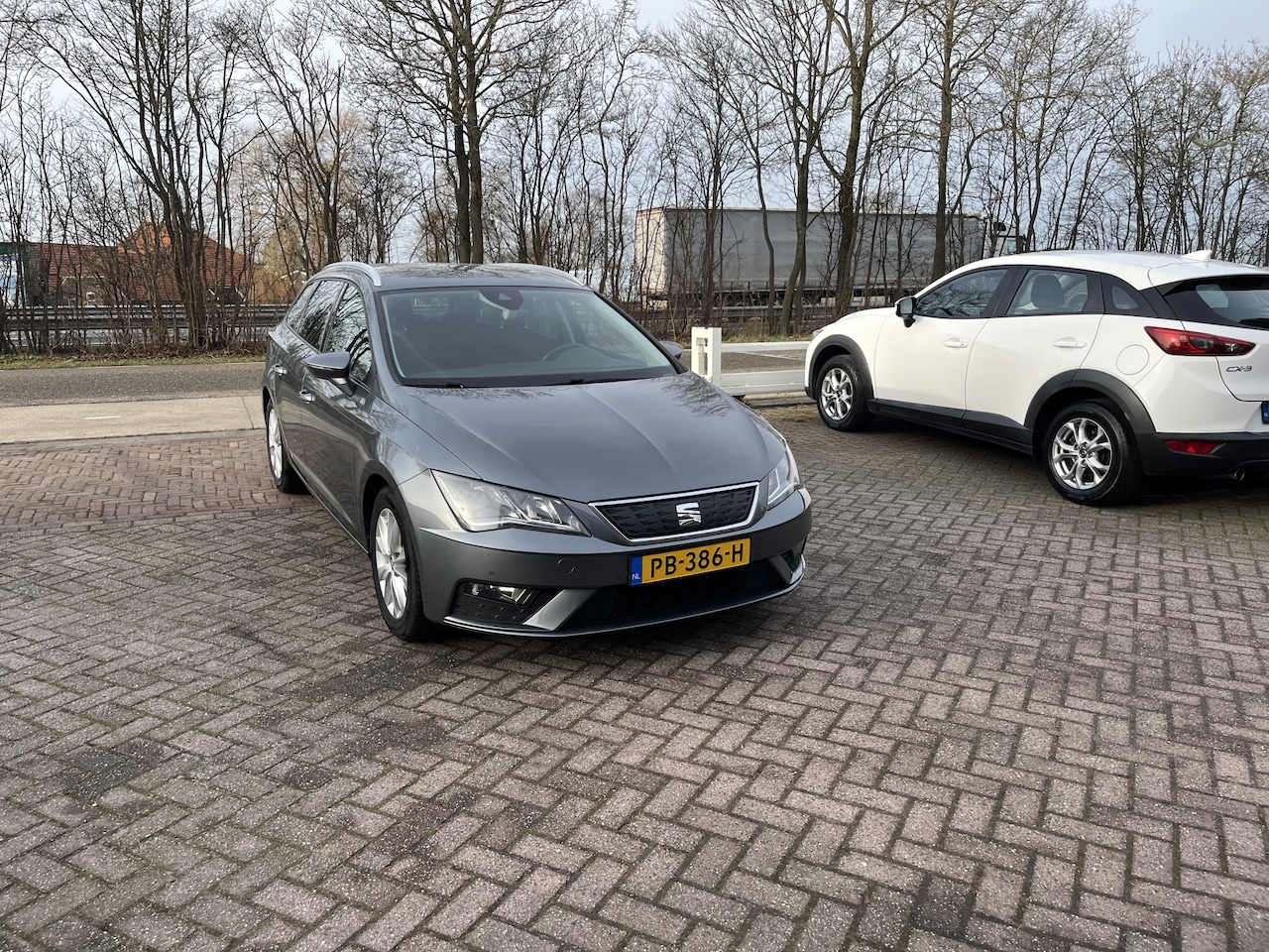 SEAT Leon ST - 1.0 EcoTSI Style Business Intense CARPLAY CLIMA KEYLESS CRUISE - AutoWereld.nl