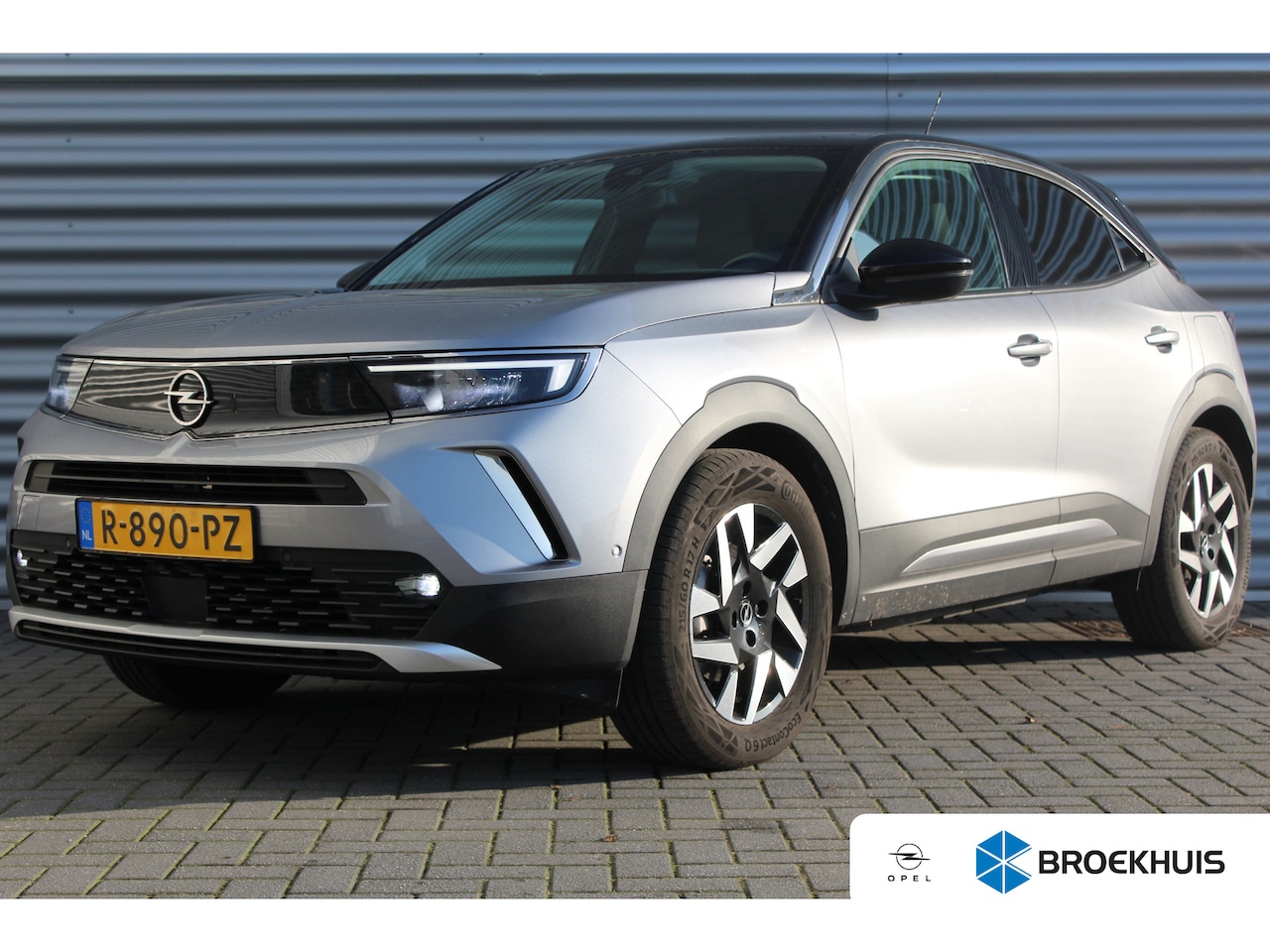 Opel Mokka-e - 50KWH 136PK ELEGANCE AUTOMAAT / NAVI / LEDER / CLIMA / LED / PDC / 17" LMV / CAMERA / WINT - AutoWereld.nl