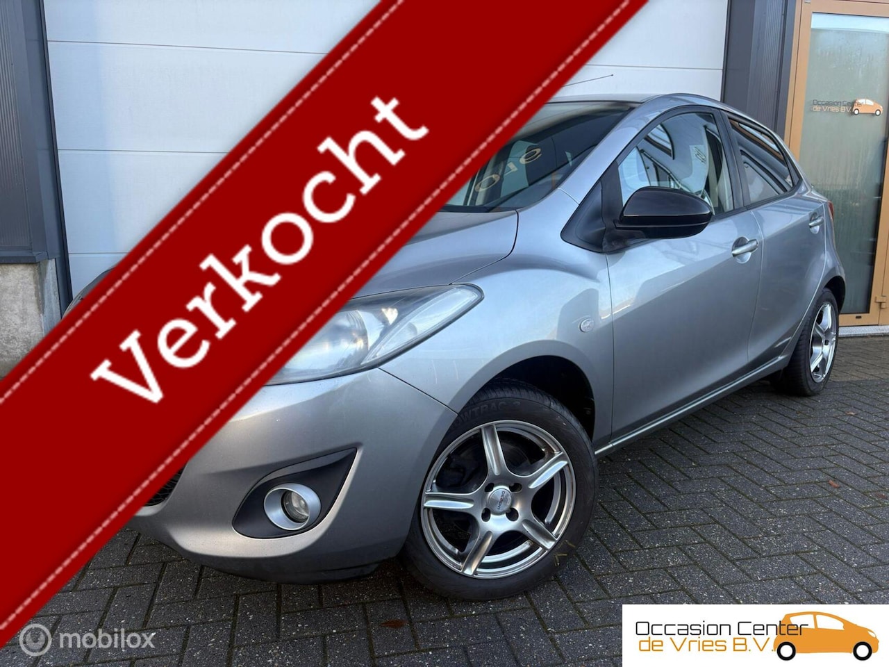 Mazda 2 - 1.3 AircoVelgenNaviCarplayParkeersensorStoelverwarmd - AutoWereld.nl