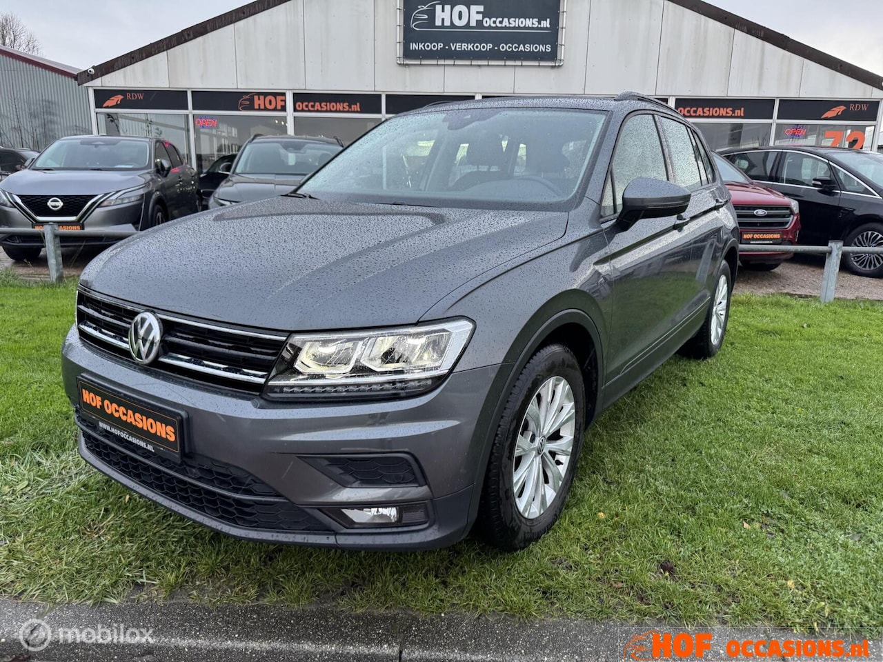 Volkswagen Tiguan - 1.5 TSI Comfortline 150pk NAVI/PDC/STOELVERW./ADAPT.CRUISE - AutoWereld.nl