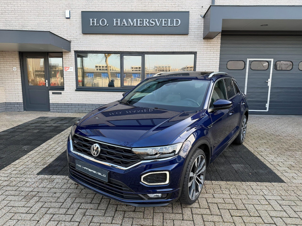 Volkswagen T-Roc - 1.5 TSI Sport Business R 1.5 TSI Sport Business R - AutoWereld.nl