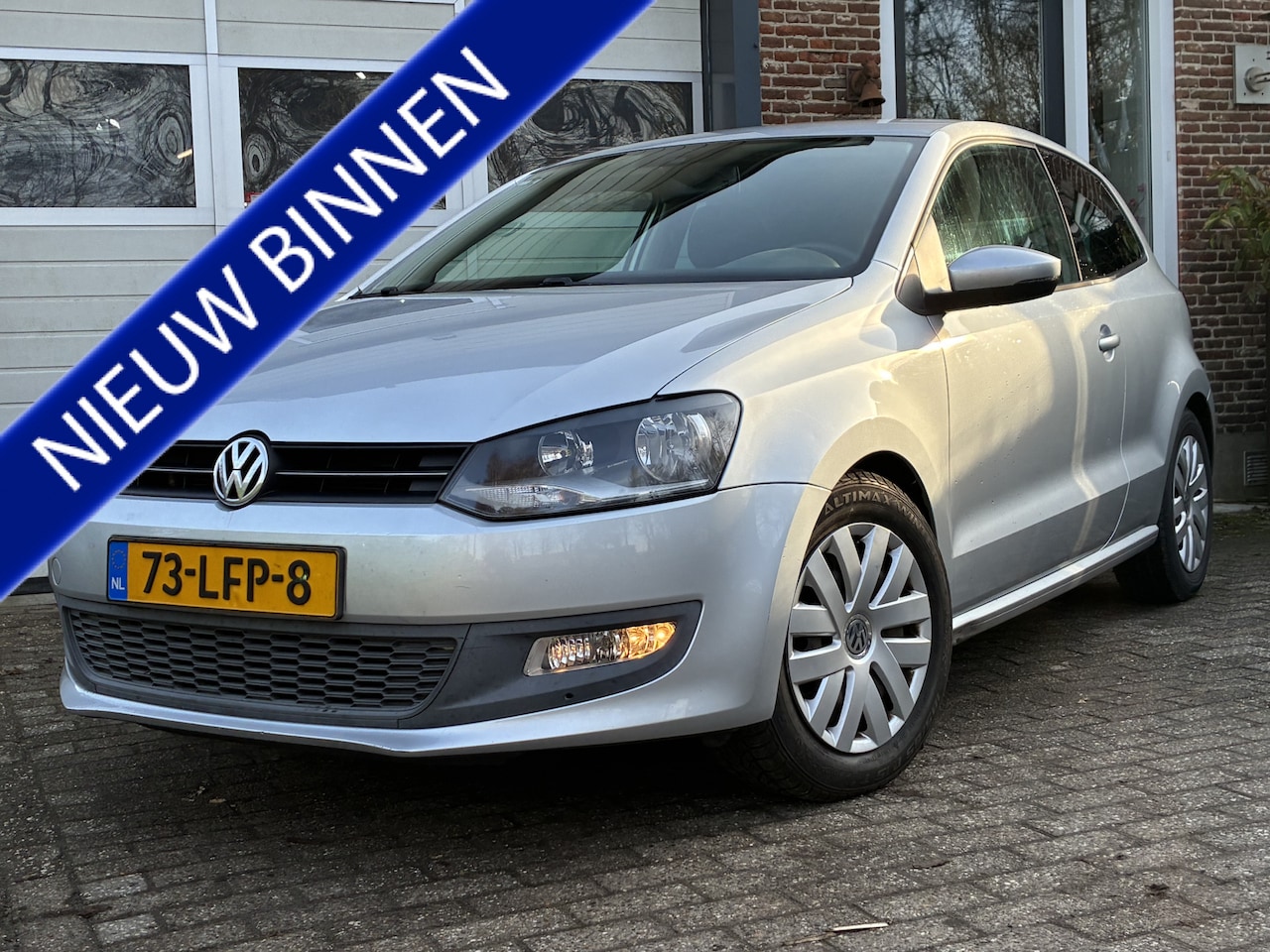 Volkswagen Polo - 1.2 TSI '10 Clima Cruise Navi PDC - AutoWereld.nl