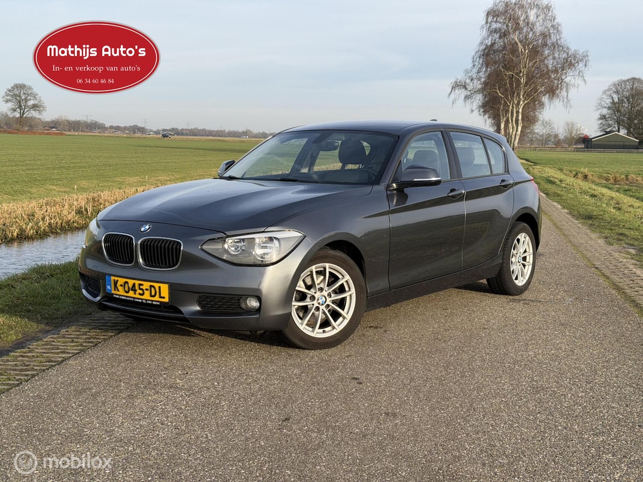 BMW 1-serie - 116i Business Automaat! 5drs! Nette auto! Nieuwe APK! - AutoWereld.nl