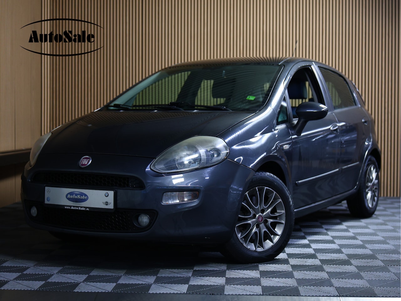 Fiat Punto Evo - 1.3 M-Jet Easy CLIMATRONIC TREKHAAK CITY '12 - AutoWereld.nl