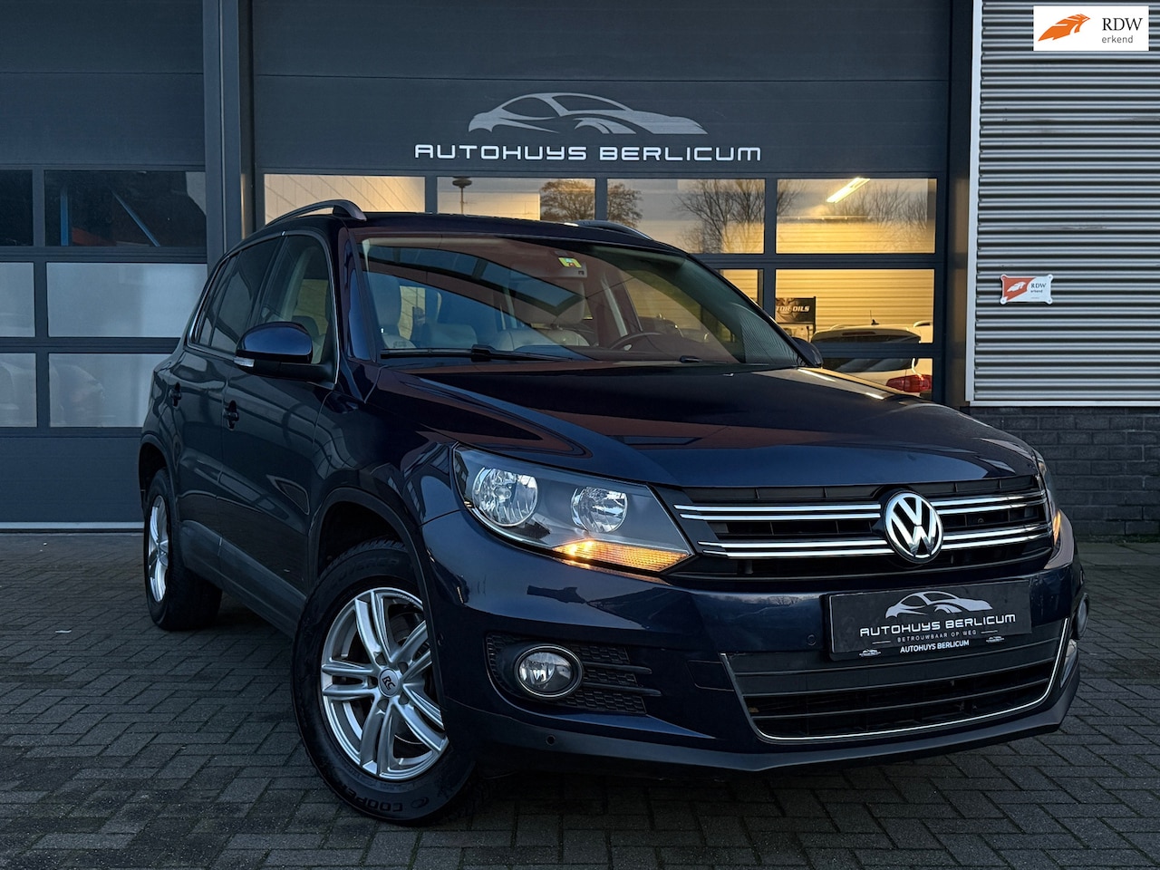 Volkswagen Tiguan - 2.0 TSI Sport&Style 4Motion Carplay Pano Leder - AutoWereld.nl