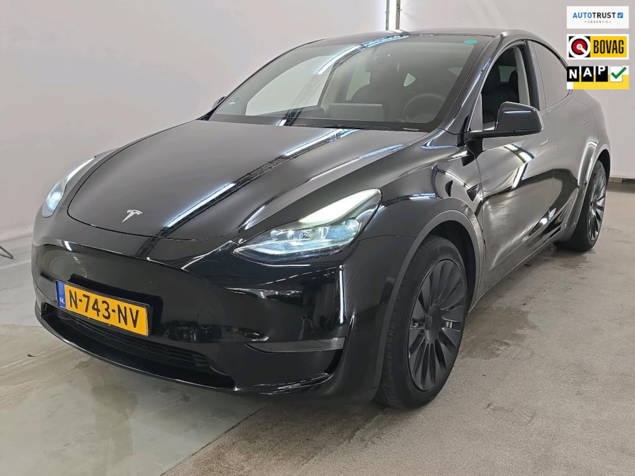 Tesla Model Y - Long Range AWD 75 kWh WARMTEPOMP LFP TREKHAAK 91% SOH - AutoWereld.nl