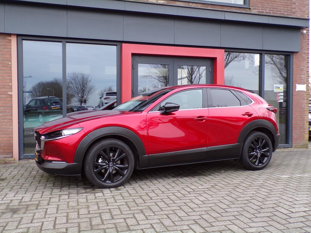 Mazda CX-30 - 2.0 e-SkyActiv-X M Hybrid Sportive Camera PDC Elec.klep NAP - AutoWereld.nl