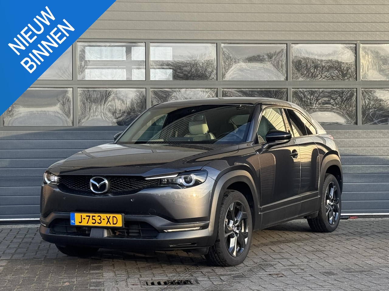 Mazda MX-30 - E-SKYACTIV 145 FIRST EDITION 36 KWH I 95% SOH I APPLE CARPLAY I P-CAMERA I ADAPTIVE CRUISE - AutoWereld.nl