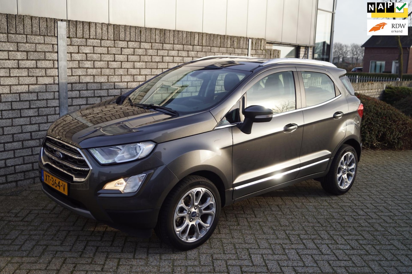 Ford EcoSport - 1.0 EcoBoost Titanium 125PK Half Leder Navi Camera Clima Cruise PDC Apple Carplay DAB LMV - AutoWereld.nl
