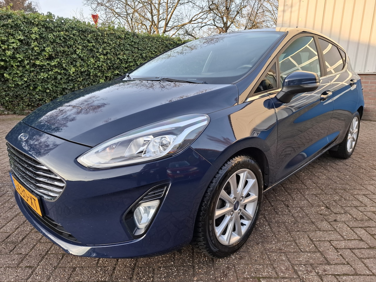 Ford Fiesta - 1.0 EcoBoost Titanium CLIMAT/CRUISE/PDC.A/LED 95PK - AutoWereld.nl