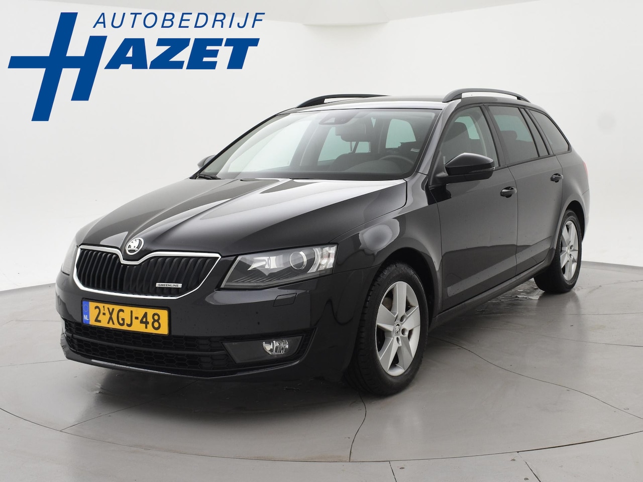 Skoda Octavia Combi - 1.6 TDI GREENLINE BUSINESS + LEDER | STOELVERW. | AFN. TREKHAAK | NAVIGATIE | DAB - AutoWereld.nl