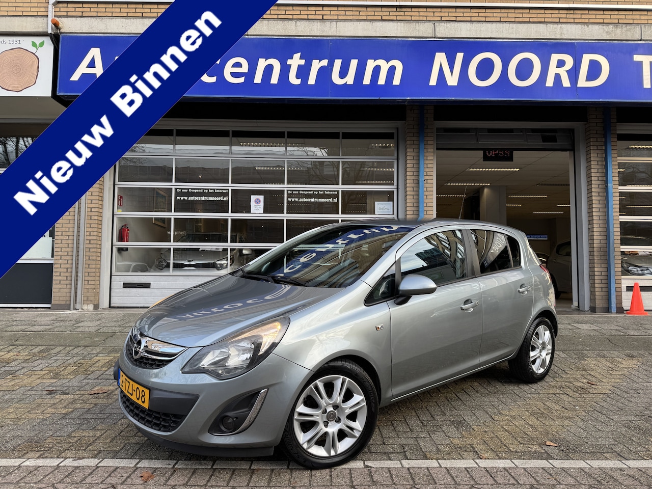 Opel Corsa - 1.4-16V BlitZ NAP | Navigatie | Climate Control | Cruise Control | Stuur + Stoelverwarming - AutoWereld.nl