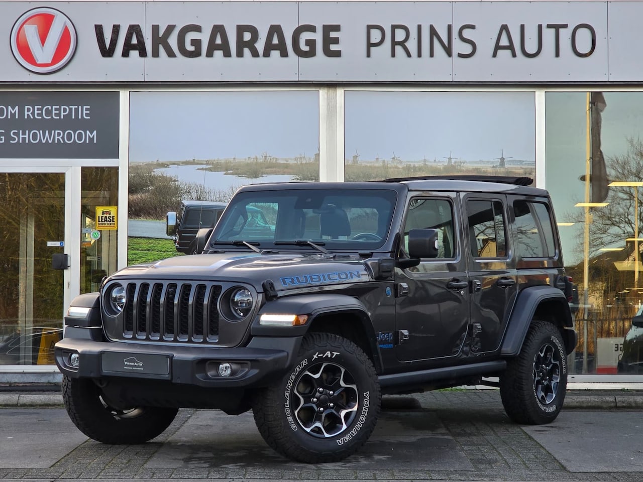 Jeep Wrangler Unlimited - 4xe 380 Rubicon |748,- P/M|STOEL+STUURVW|NAVI|CAMERA|SOFTTOP| 4155 - AutoWereld.nl