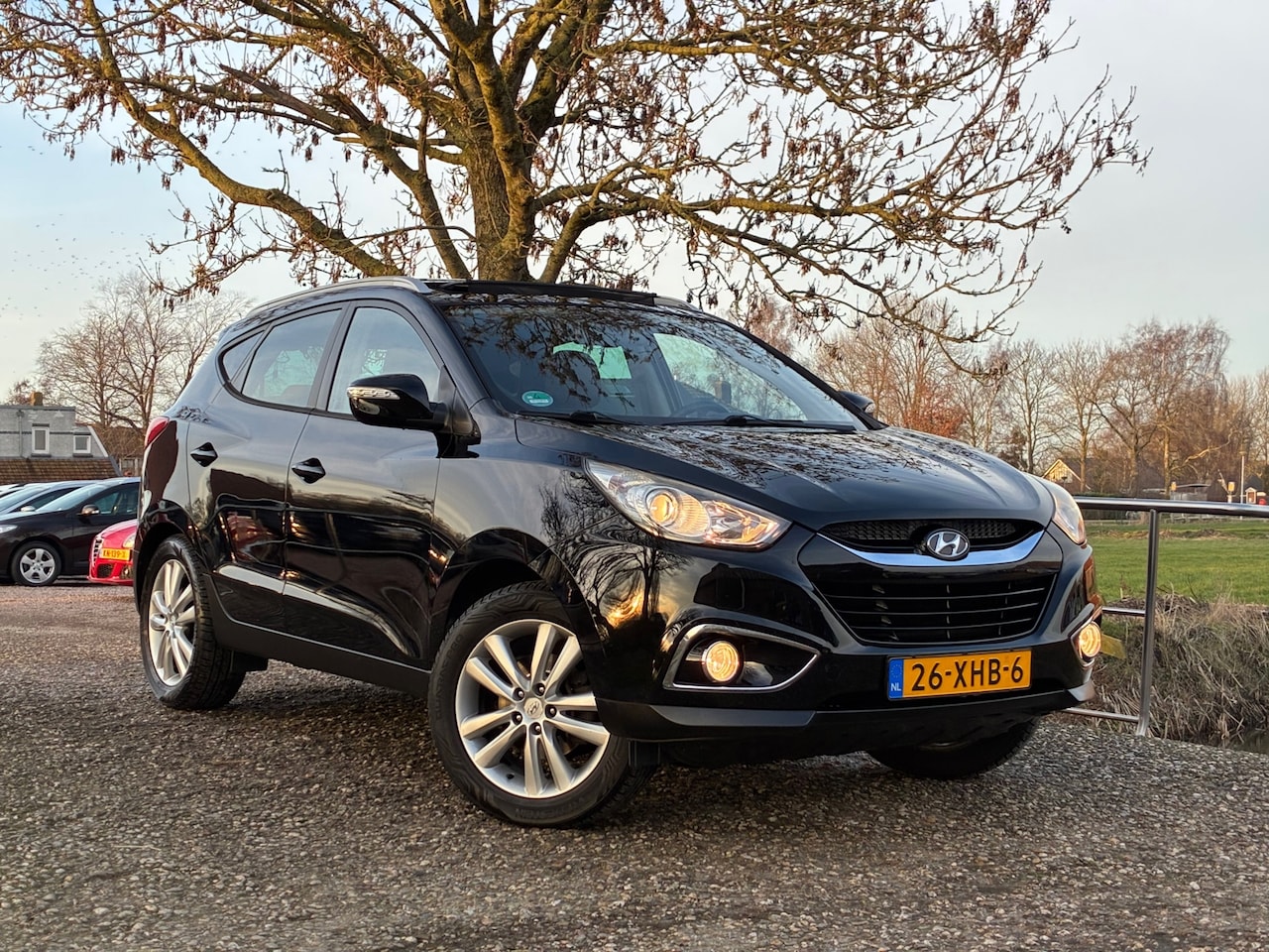 Hyundai ix35 - 2.0i i-Catcher | Automaat | Leder + Pano/schuif dak + Navi + Clima + Cruise nu €8.975,-!! - AutoWereld.nl