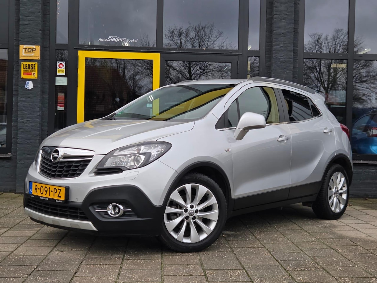 Opel Mokka - 1.4 T | Cosmo | Trekhaak | Stoelv. | Park. Sensoren | Navi | Tel | Park Cam |Climate contr - AutoWereld.nl