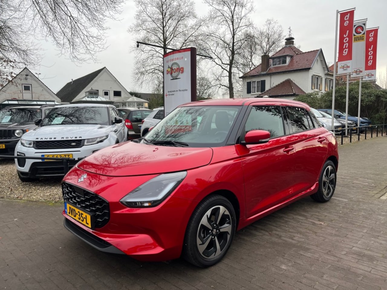 Suzuki Swift - 1.2 STYLE SMART HYBRID AUTOMAAT / NAVI / CAMERA / CARPLAY / ADAP. CRUISE - AutoWereld.nl