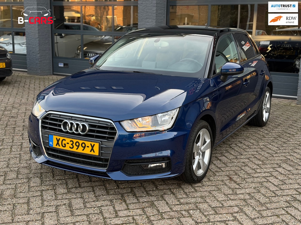 Audi A1 Sportback - 1.0 TFSI Leer|Stoelvw|Navi|Pdc|5Drs - AutoWereld.nl