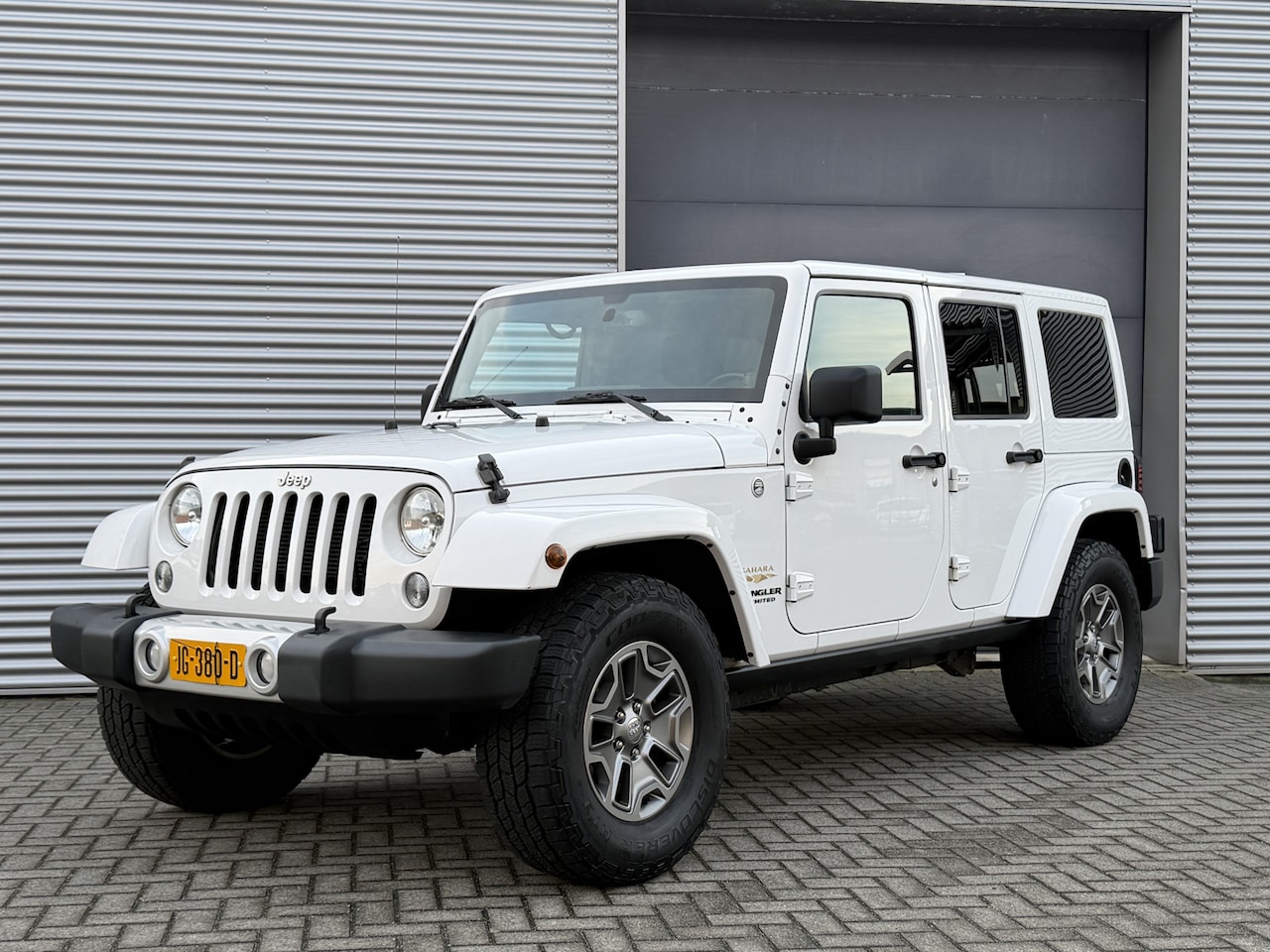 Jeep Wrangler Unlimited - 3.6 Sahara I Aut. I Hardtop I Leder I Navi I 73000 km - AutoWereld.nl