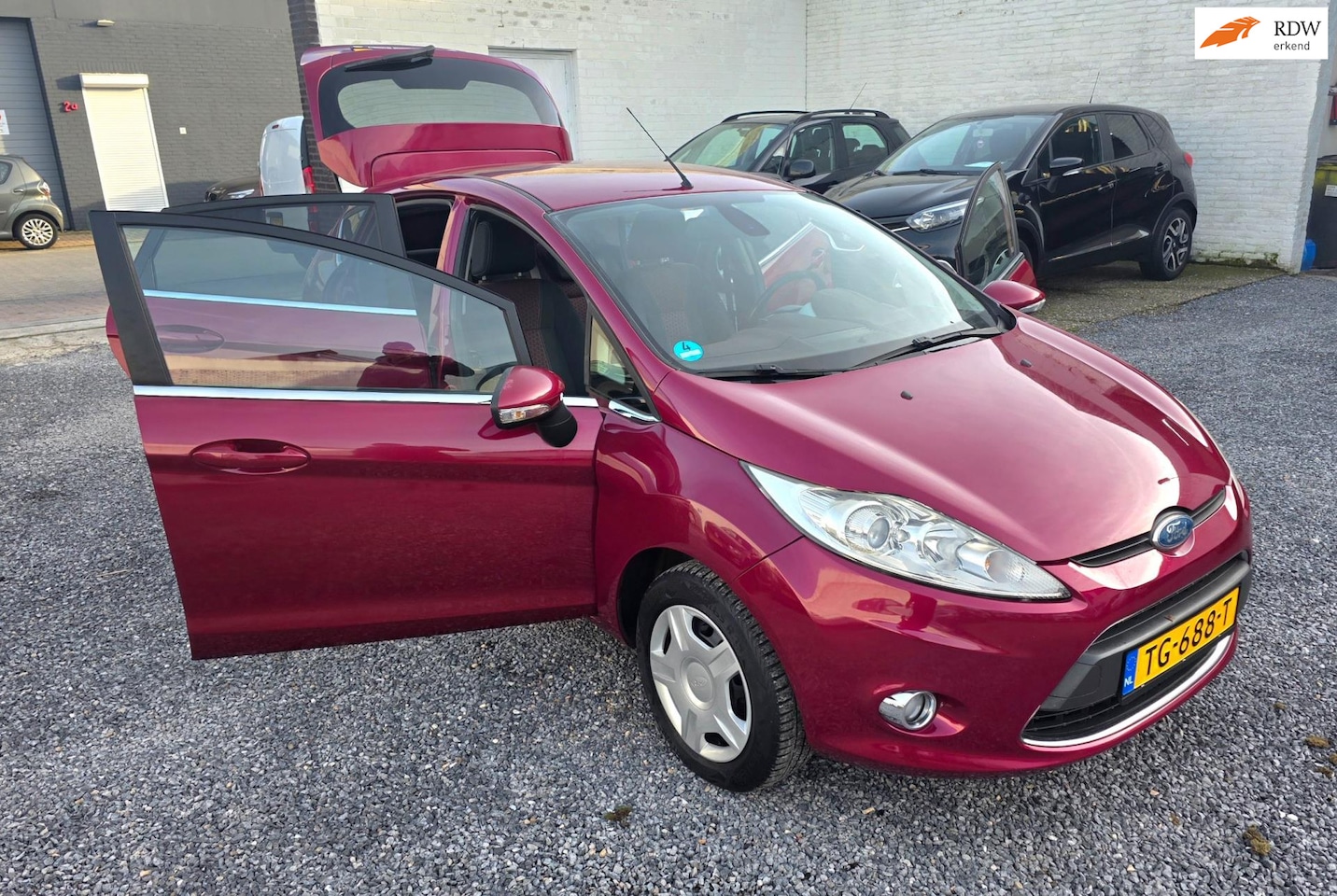 Ford Fiesta - 1.25 Ghia 1.25 Ghia - AutoWereld.nl