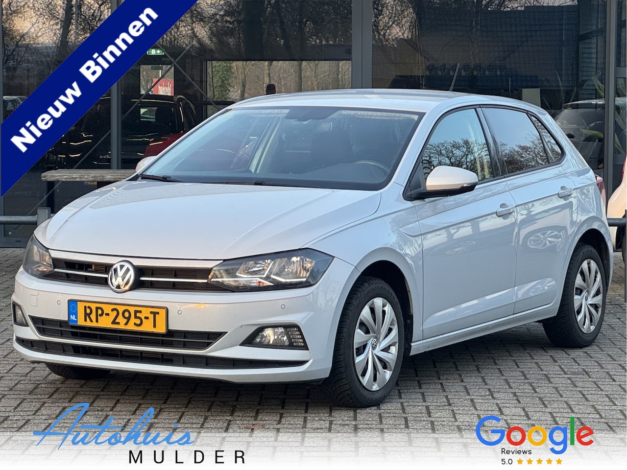 Volkswagen Polo - 1.0 TSI Comfortline Navigatie/Airco/Cruise/PDC/Getint glas - AutoWereld.nl