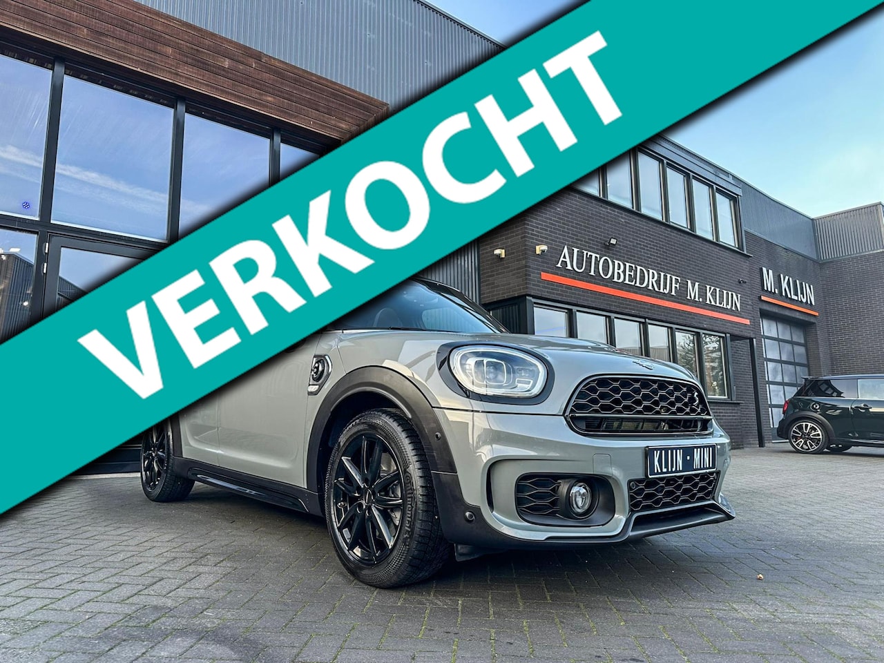 MINI Countryman - Mini 2.0 Cooper S E ALL4 John Cooper Works 220pk/Nardo/Pano/Hk/19"Jcw/vol/Btw - AutoWereld.nl
