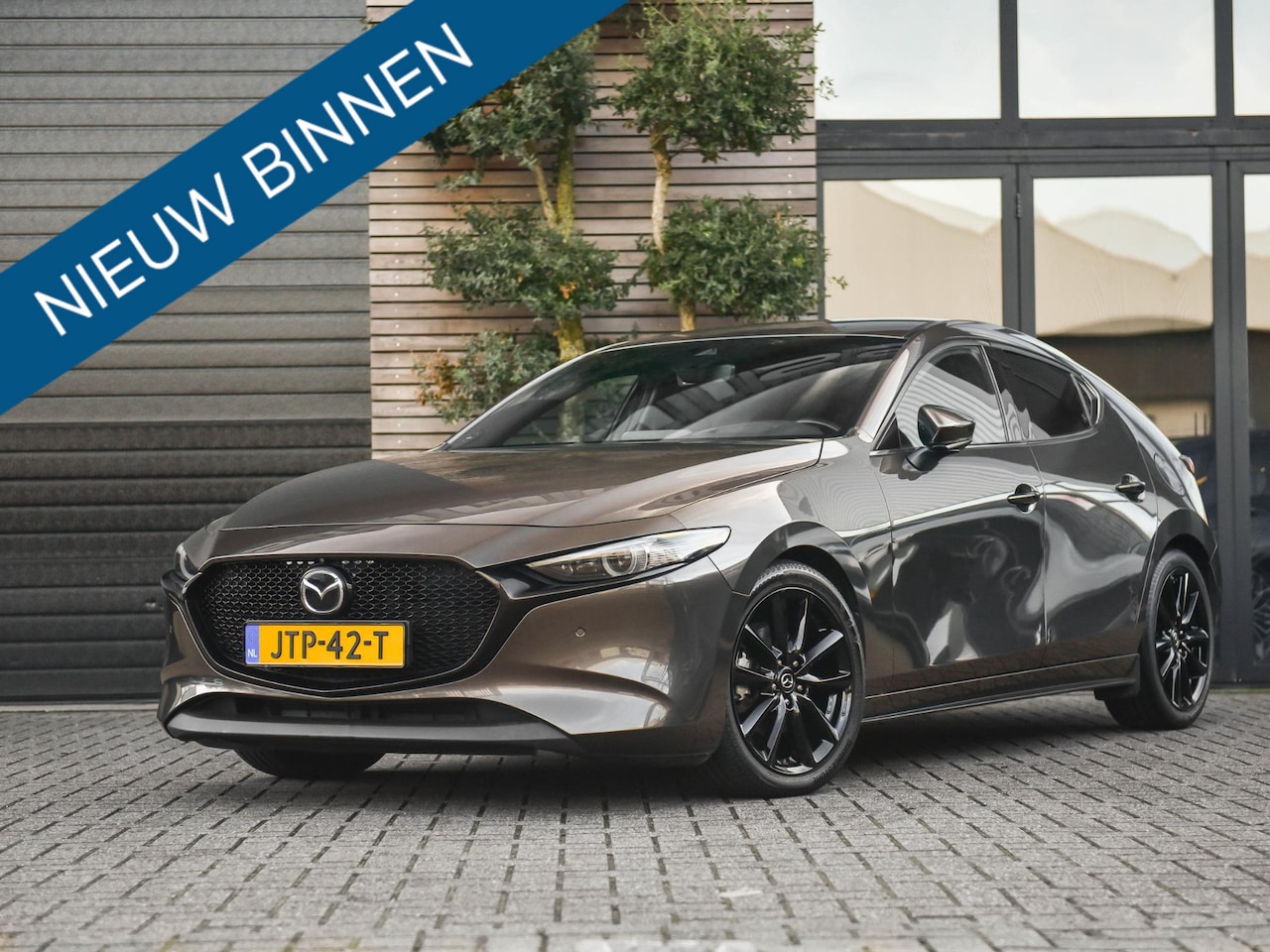 Mazda 3 - 2.0 e-SkyActiv-G M Hybrid 122 Luxury Leren bekleding Bose 360 camera Adaptive Cruise Contr - AutoWereld.nl