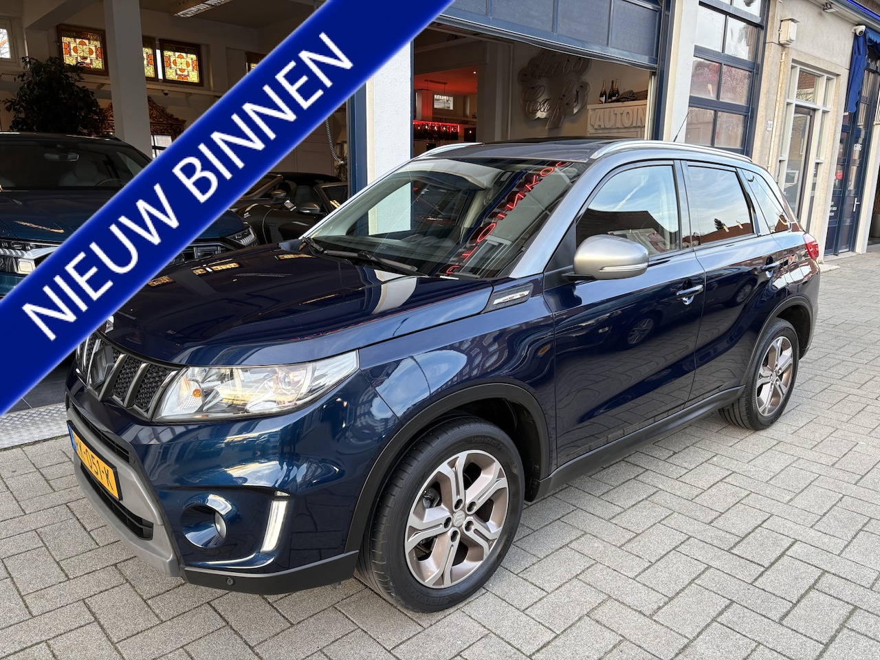 Suzuki Vitara - 1.6 High Executive Allgrip FULL OPTIONS/4WD/PANO/TOPSTAAT - AutoWereld.nl