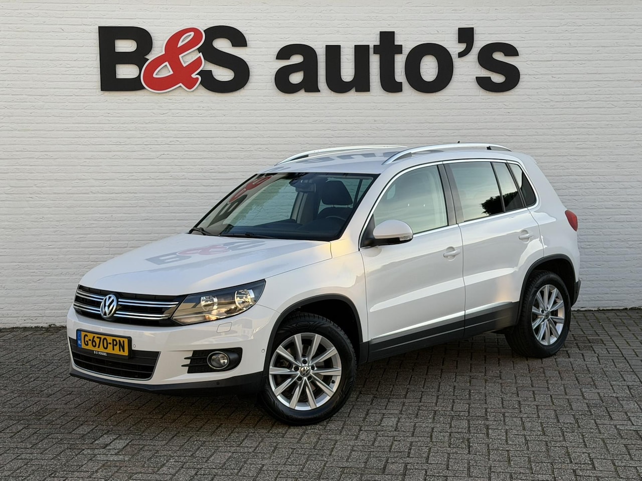 Volkswagen Tiguan - 1.4 TSI Sport Nette Auto! All season Airco Pdc Park assist Aut. Verlichting - AutoWereld.nl
