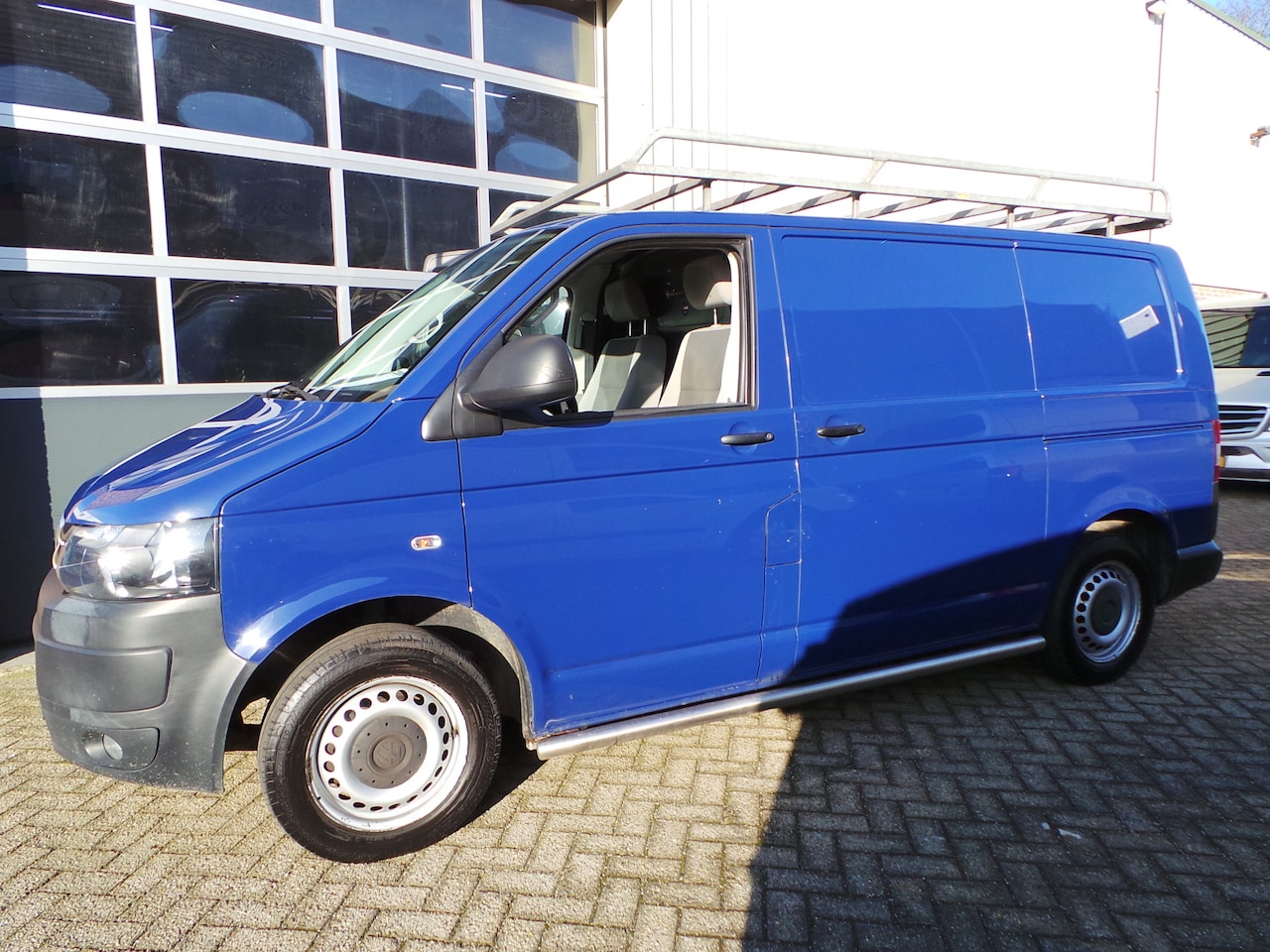 Volkswagen Transporter - 2.0 TDI 102pk L1H1 Airco 2 schuifdeuren,Trekhaak,Imperiaal - AutoWereld.nl