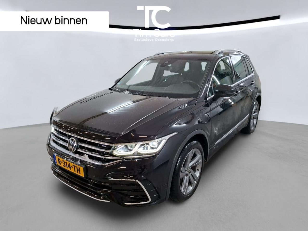 Volkswagen Tiguan - 1.4 TSI eHybrid R-Line Automaat | Trekhaak | Cruise control adaptief | Climate control | A - AutoWereld.nl
