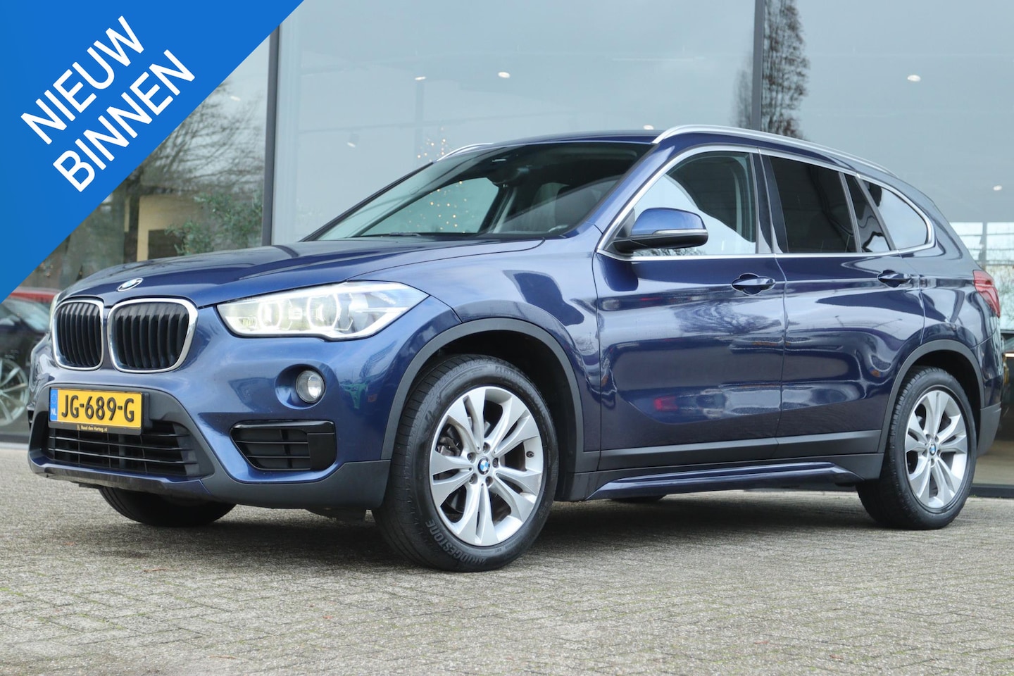BMW X1 - SDRIVE16D CORPORATE LEASE SPORT | LED | LEDER | HUD | NAVI | CRUISE | CLIMATE - AutoWereld.nl