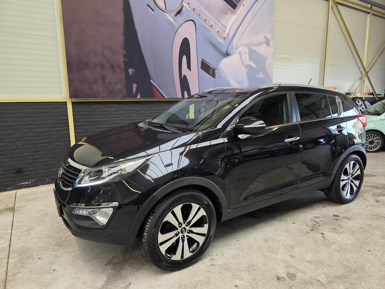 Kia Sportage - 2.0 X-clusive 2.0 X-clusive - AutoWereld.nl