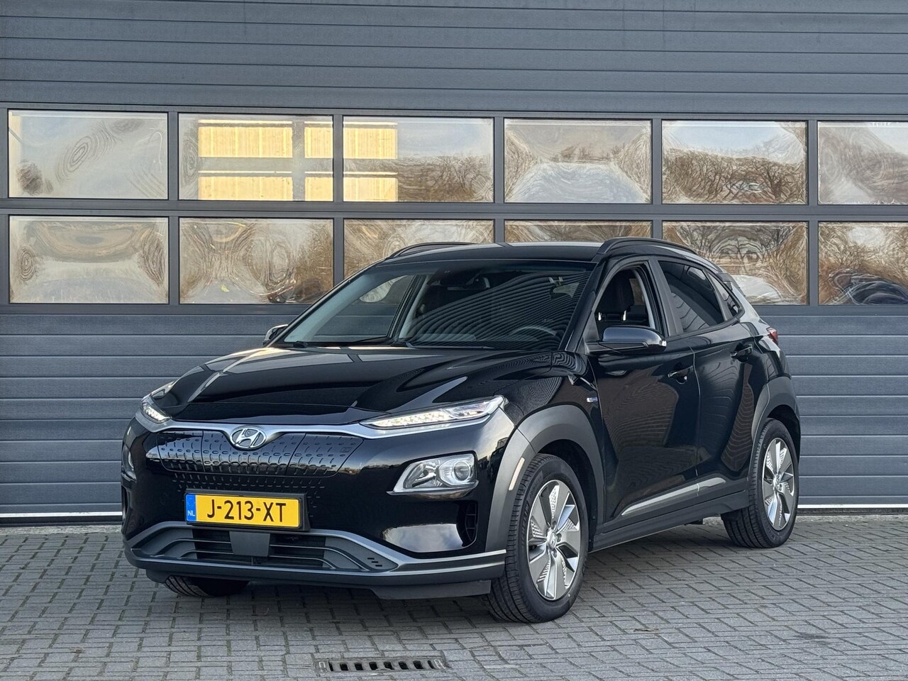 Hyundai Kona Electric - EV FASHION 64 KWH I 3 FASE I 100% SOH I P-CAMERA I AUTOMAAT I APPLE CARPLAY - AutoWereld.nl