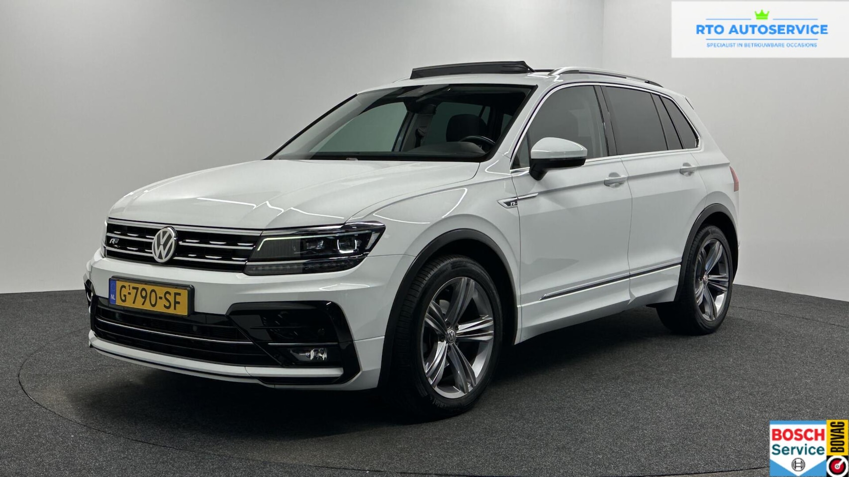 Volkswagen Tiguan - 1.5 TSI ACT Highline Business R CAMERA TREKHAAK ECC NAVI. - AutoWereld.nl