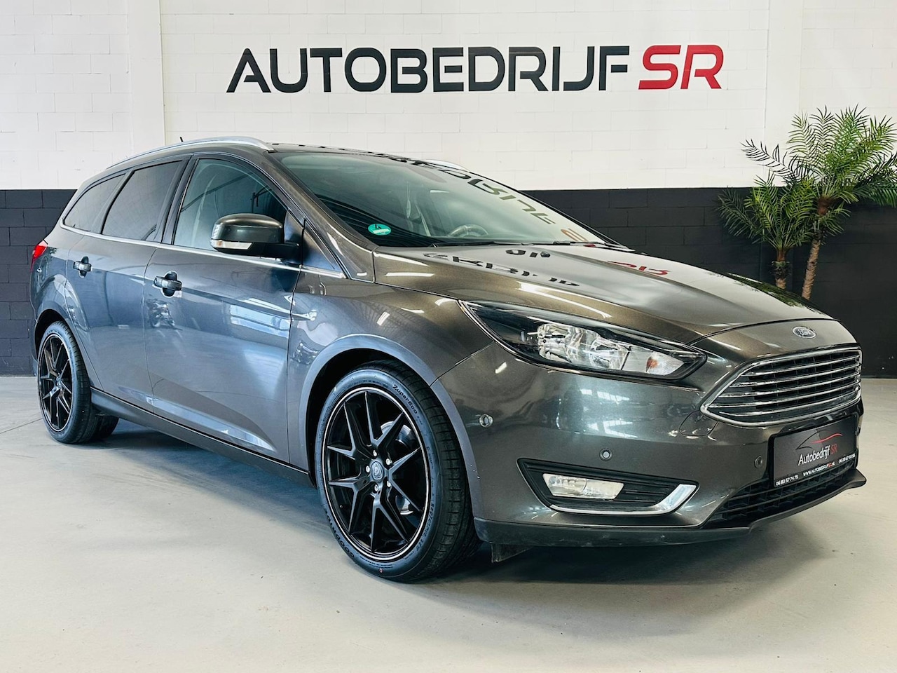 Ford Focus Wagon - 1.0 Titanium Nwe Banden! Nieuwe Distributie! Cruise Controle! Navigatie! Vol opties - AutoWereld.nl