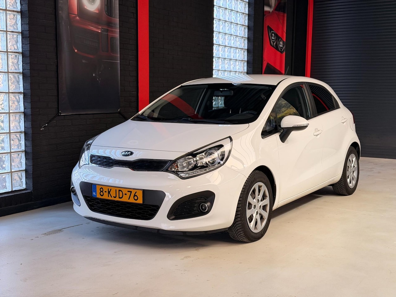 Kia Rio - 1.2 CVVT Plus Pack |NAVI|PDC|AIRCO|ORI NL - AutoWereld.nl