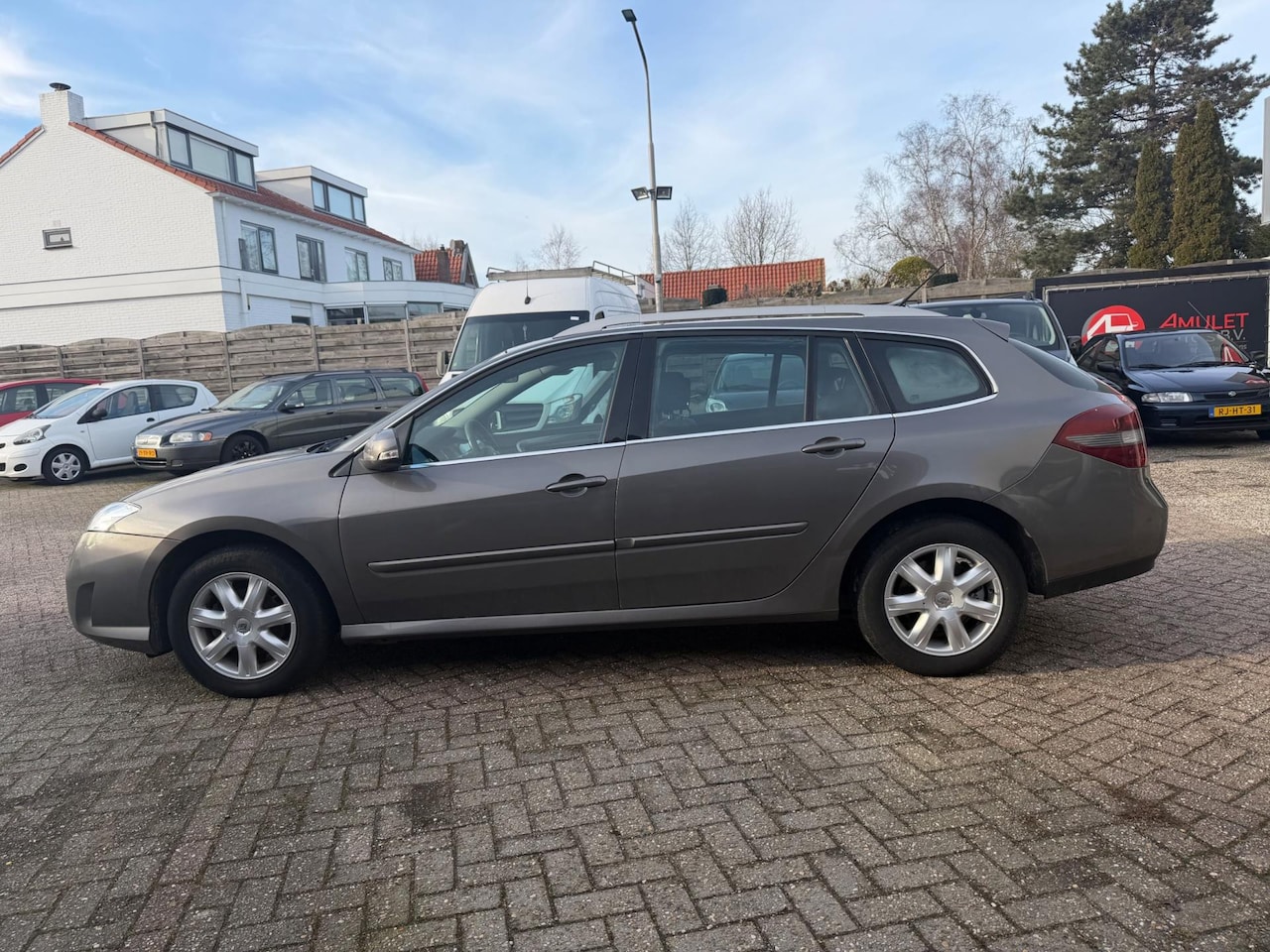 Renault Laguna Estate - 1.5dCi,81kw/110pk,E4,Expr.4-2010: 2850,- - AutoWereld.nl