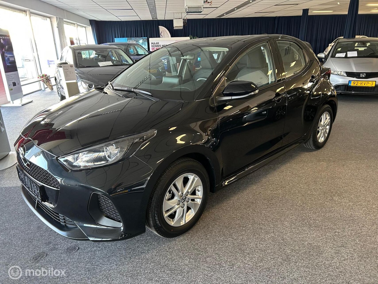 Toyota Yaris - Mazda 2 1.5 Hybrid 115 Active - AutoWereld.nl