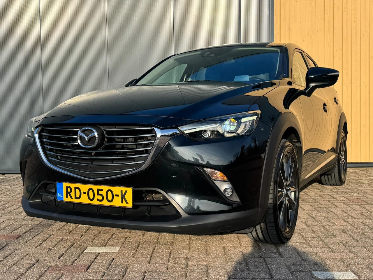 Mazda CX-3 - 2.0 SKYACTIV-G 120pk AUT GT-M | HUD | Clima | Cruise | Trekhaak | Navi | - AutoWereld.nl