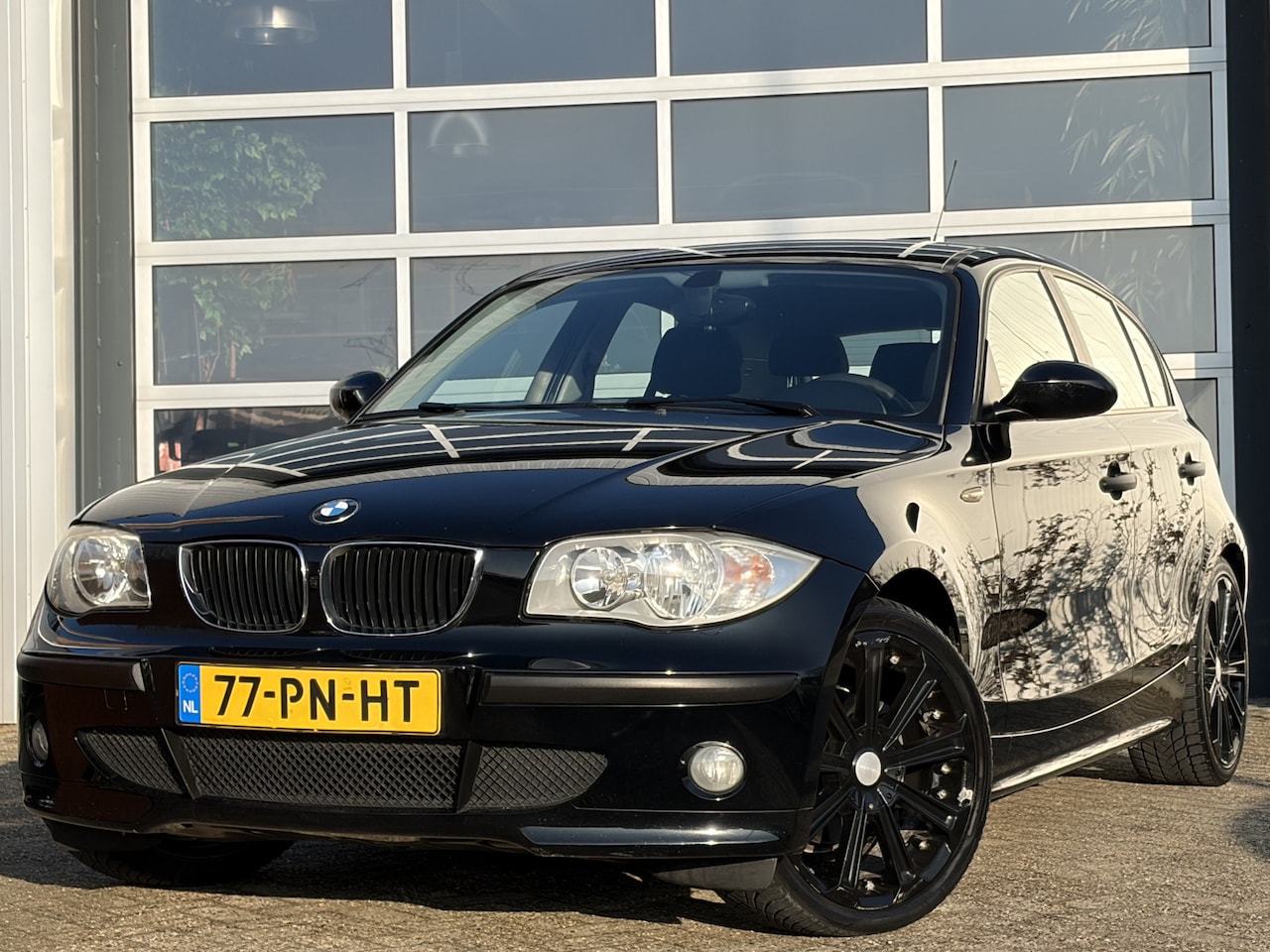 BMW 1-serie - 116i Essential 116pk | Airco automatisch | Cruise control | Elektrische ramen voor | Licht - AutoWereld.nl