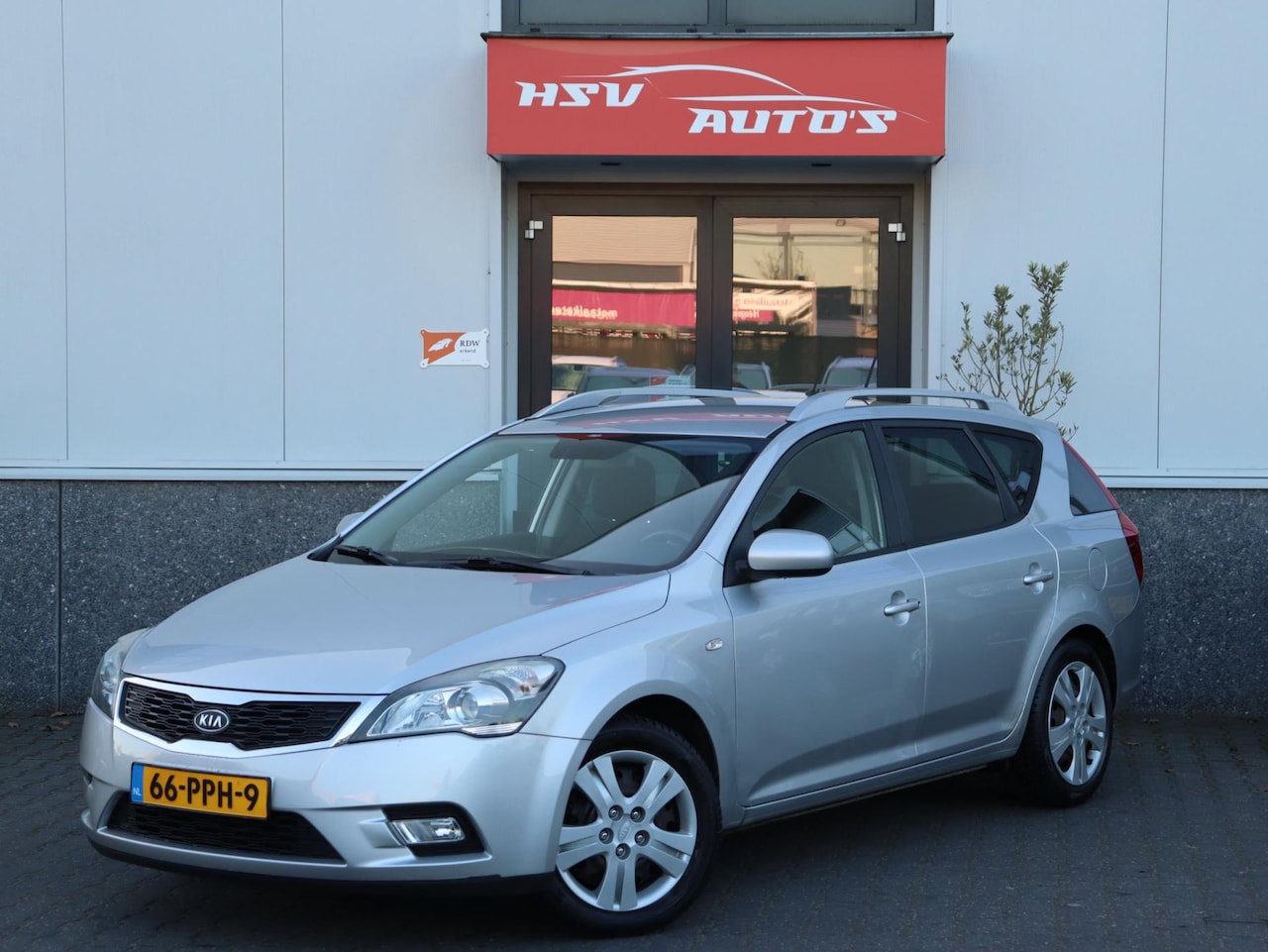 Kia Cee'd - 1.4 CVVT X-tra navi airco trekhaak org NL - AutoWereld.nl
