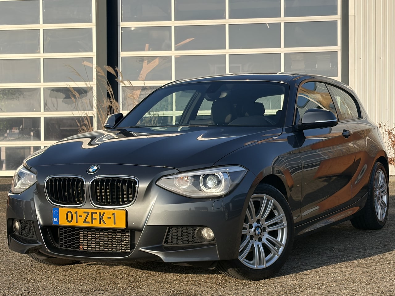 BMW 1-serie - 116i Business+ M Sportpakket 136pk | Org. NL | 68.514km NAP | Airco automatisch | Bi-xenon - AutoWereld.nl