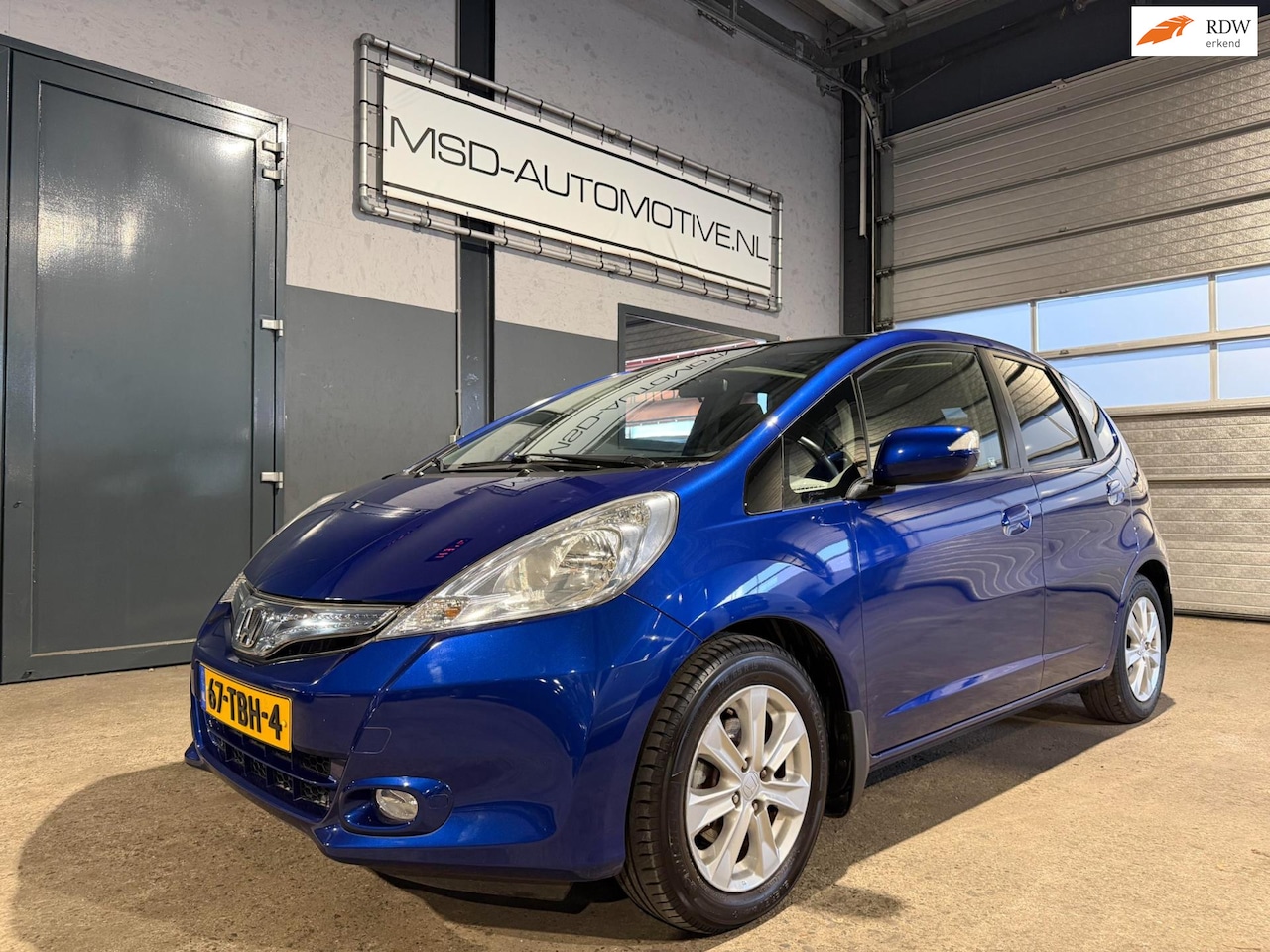 Honda Jazz - 1.4 Hybrid Elegance 1e Eigenaar Panoramadak NAP - AutoWereld.nl
