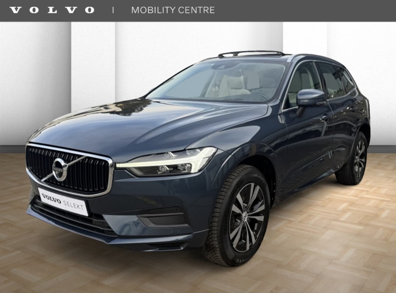 Volvo XC60 - B5 Momentum Exclusive | Heads-up Display | Elektrisch glazen pan - AutoWereld.nl