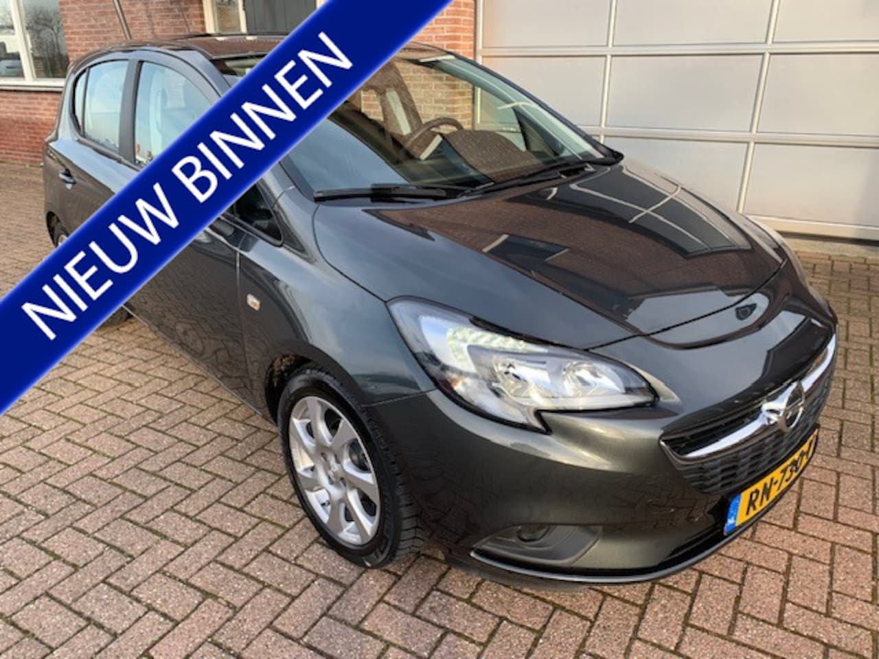 Opel Corsa - 1.4 Online Edition 45.000 km - AutoWereld.nl