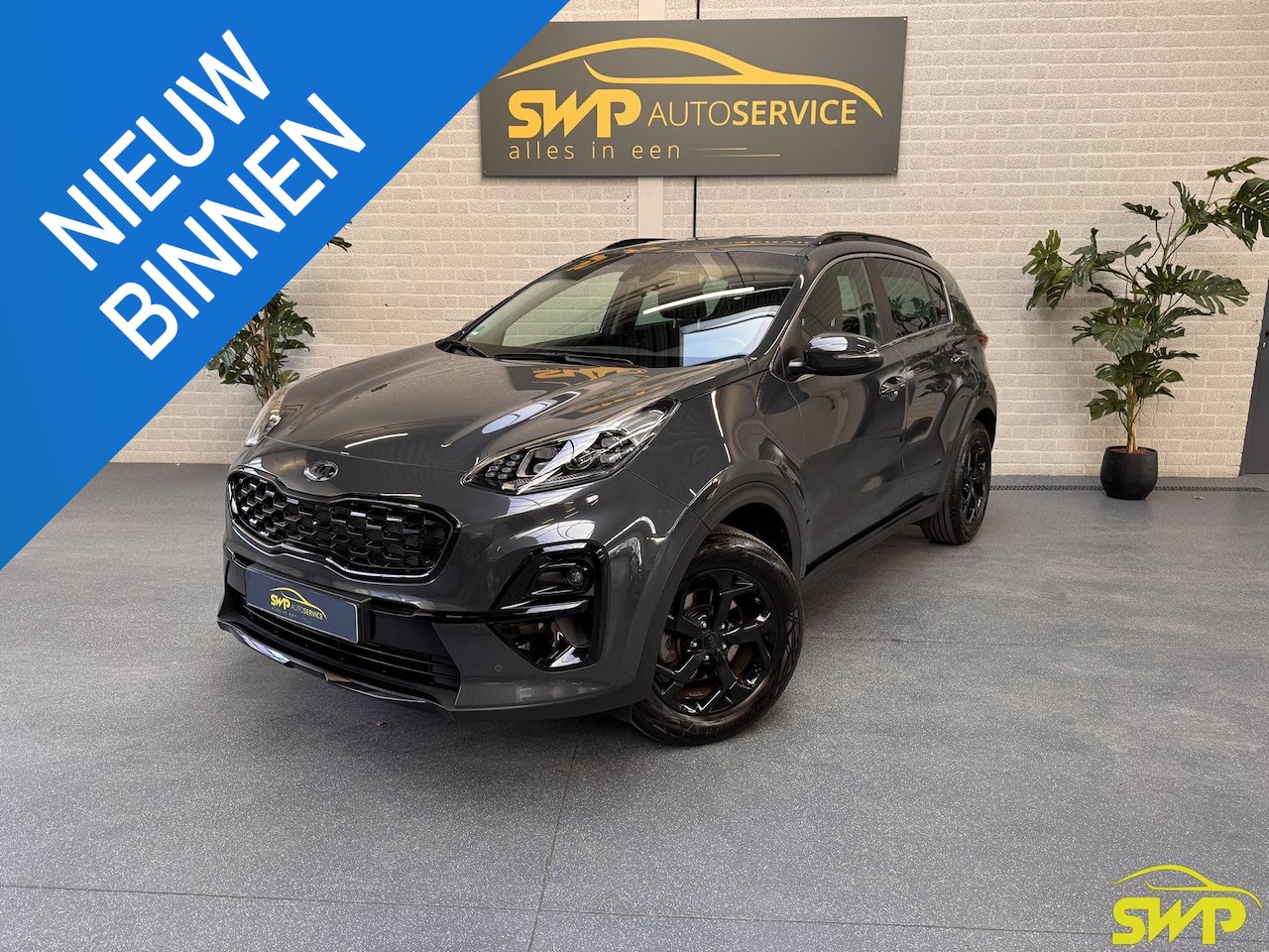 Kia Sportage - 1.6 GDI DynamicLine | Black pack | Navi | Cam | Stoelverwarming | Stuurverwarming | JBL - AutoWereld.nl