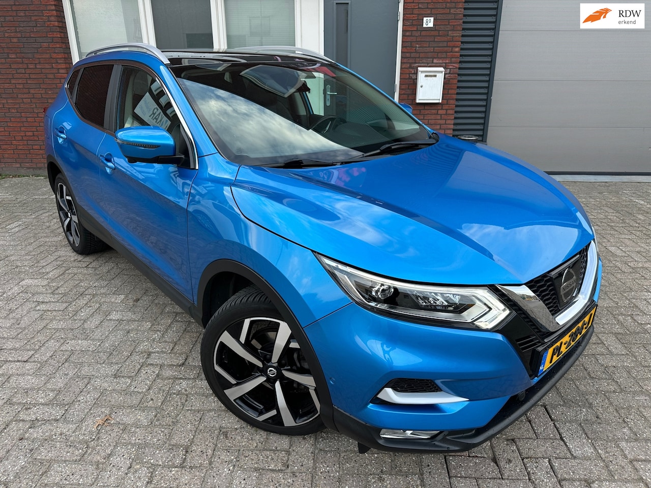 Nissan Qashqai - 1.2 Tekna / Pano / Bose / Leder / Camera / PDC / LED - AutoWereld.nl