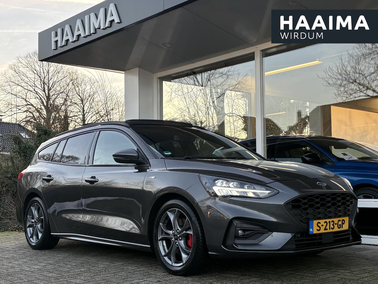 Ford Focus Wagon - 1.0 EcoBoost Hybrid ST Line X Business | Schuif-/kanteldak | Winterpack | Achteruitrijcame - AutoWereld.nl
